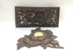 A carved and gilded wooden panel of a dragon, approx 39cm x 18.5cm plus a carved wooden floral