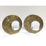 A pair of circular brass photo frames of Art Nouveau style, approx height 16cm.