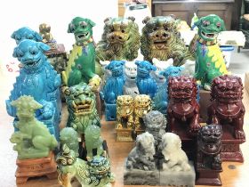 A Collection of Fo dogs ranging from 8-25cm tall.