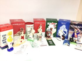 A collection of boxed Royal Doulton collectible po