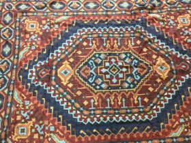 A large unusual pattern rug. 203x153cm Postage D