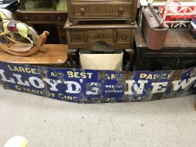 A large Lloyds News Enamle sign. Approximately 96 inches wide and 18 inches high. NO RESERVE