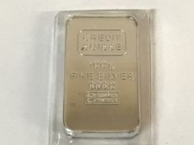 Silver 100g bar made by credit suisse. The back of