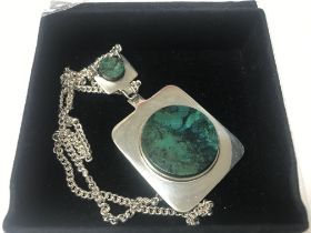 A silver and malachite heavy pendant and chain. Ap