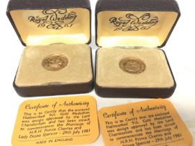A pair of boxed 9ct medallion HRH Charles/Dianna m