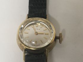 A 9carat gold cased ladies CYMA watch with a leath