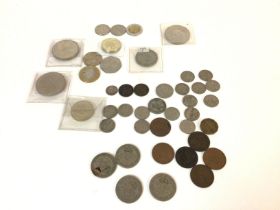 A collection of coinage including shillings - six