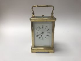 A Carriage clock, approx 9x12.5cm.