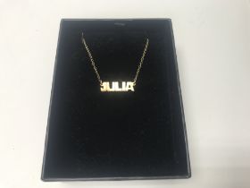 A 9ct gold Julia name pendant and chain, approx 1.
