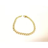 A 9ct gold Cuban link bracelet. 18cm length and 5.