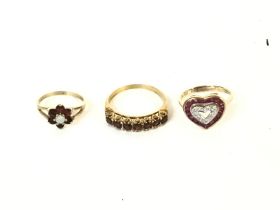 Three 9ct gold rings set with various stones inclu