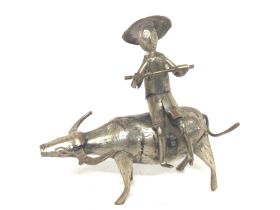 Nepalese Silver figure riding in a small water buf