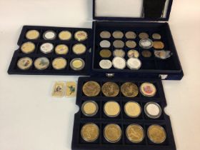 A collection of various coins and rounds including