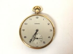 A 9k gold garrard button wind pocket watch. 55g an