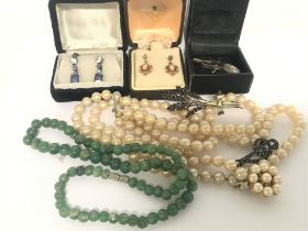 A small collection of costume jewellery including