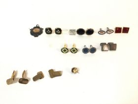 A collection of assorted cuff links including 2 9c