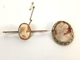 A 9ct gold brooch set with a cameo with a conformi