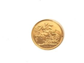 A 2014 full gold sovereign.