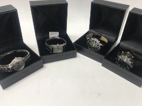 A collection of 8 quartz watches, including Armani