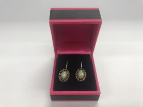 A pair of 9ct gold Opal earrings, approx 1.80 gram