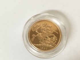 A 1980 full gold proof sovereign. Postage B