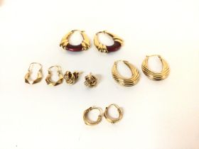 A collection of 9ct gold hollow gold earrings. Tot