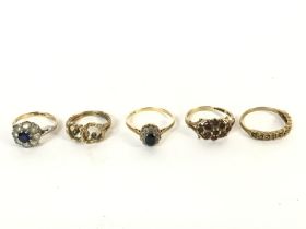 A collection of 5 9ct gold rings all set with vari