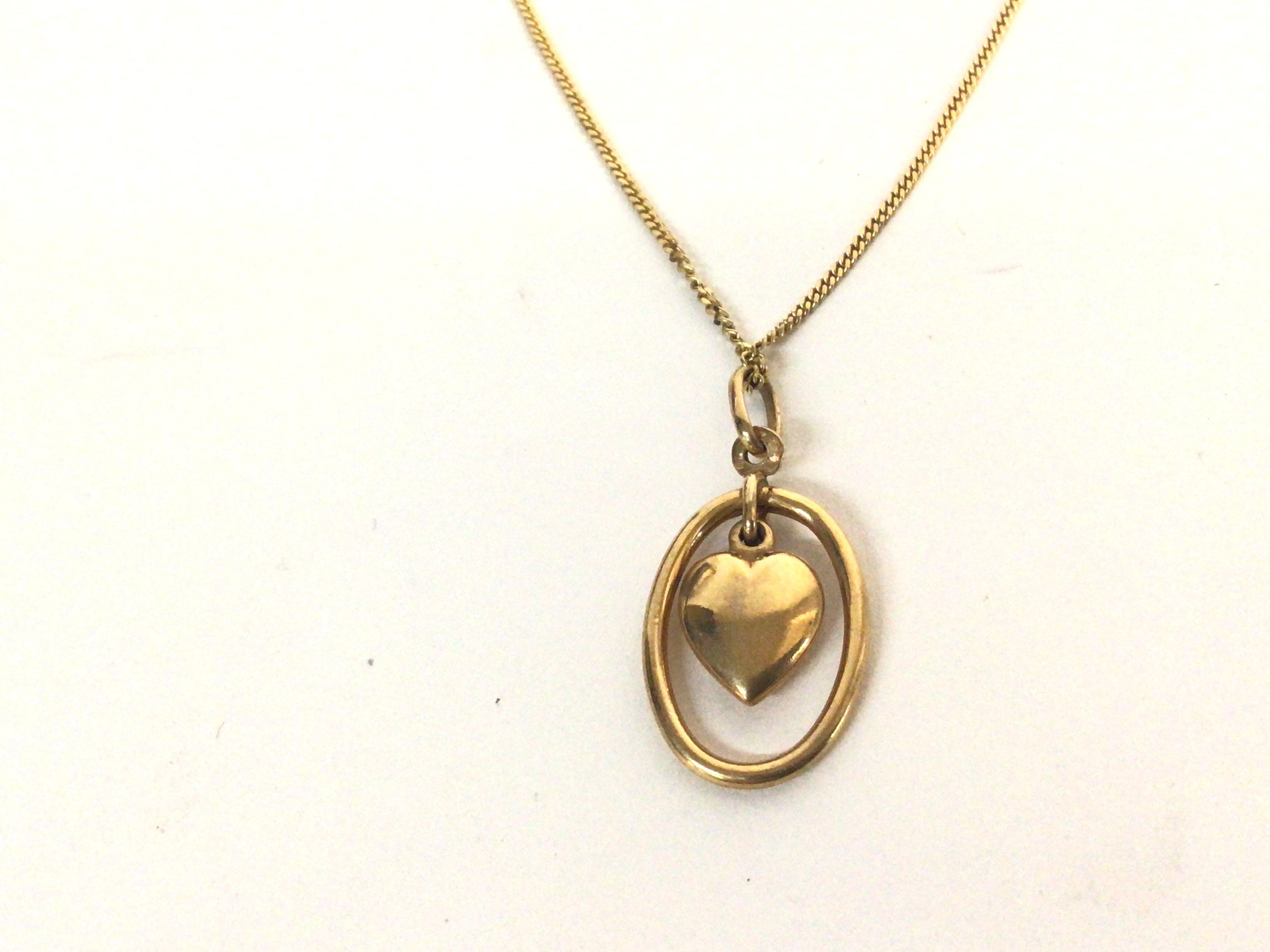 An 18ct gold necklace set with attached heart pend - Image 2 of 2