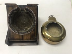 Two pocket watch holders.