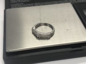 A 9ct white gold diamond triple pava ring approx 1