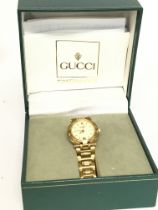 A boxed Gucci Ladies Watch 9200L. Postage category