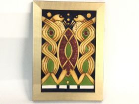 A framed Moorcroft wall plaque. 27cm by 19cm. Post