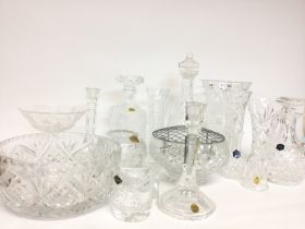 A collection of various cut glass items including