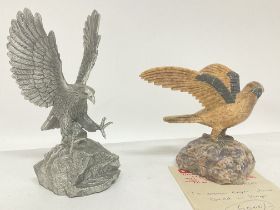 Eagle figurines including a stone hand carved made