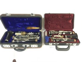 Two cased Clarinets including a Jupiter composite