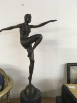 A Art deco style figure in the form of a dancing m