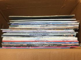 A box of LPs by various artists including Free, Pa