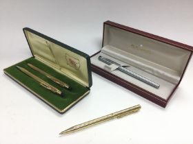 A collection of pens comprising Cross and Sheaffer