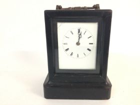 A vintage quality carriage clock. 15.5cm tall by 1