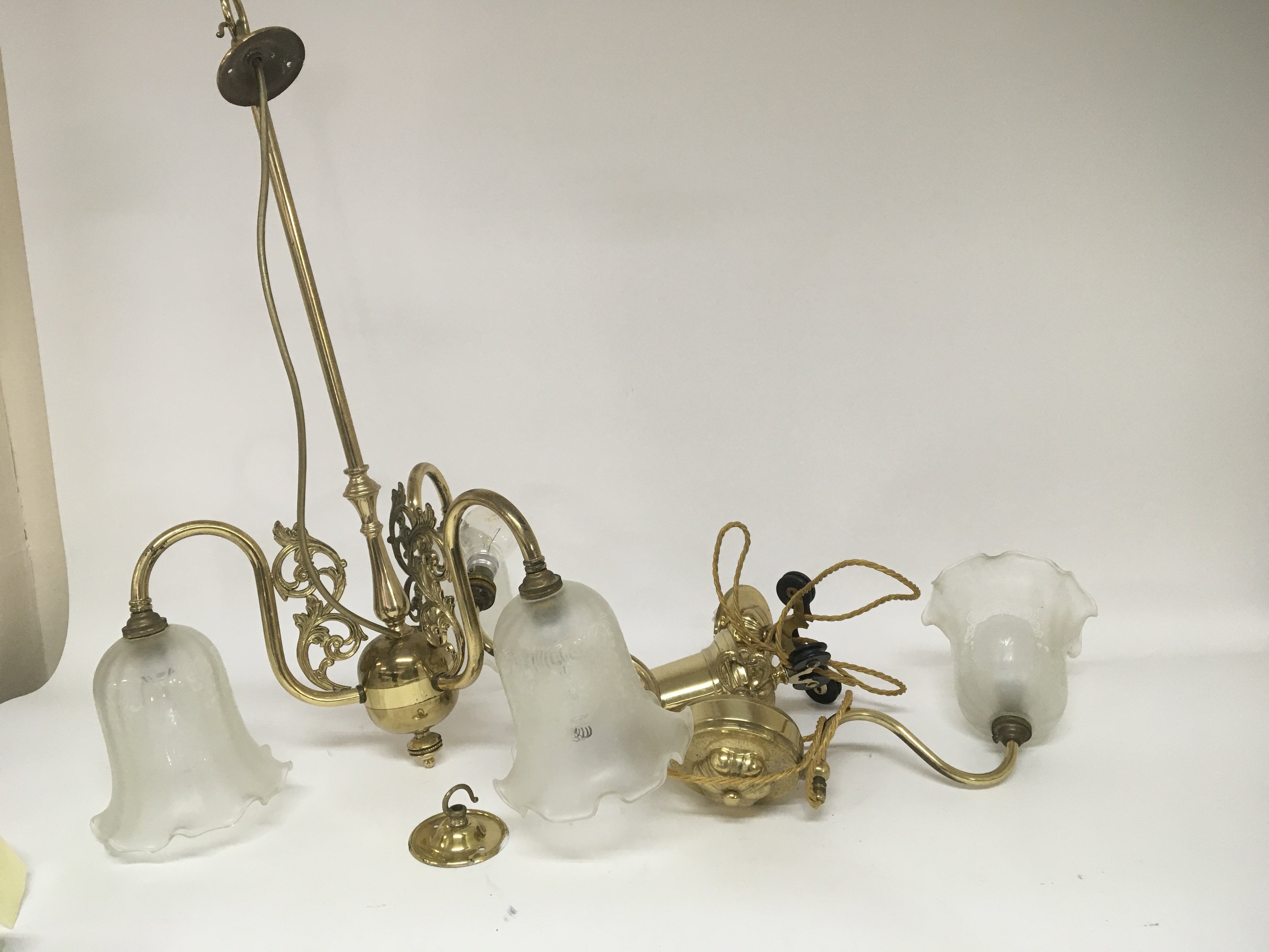 Two brass light fittings with acid etched glass sh