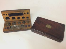 A small vintage mahogany box with a brass label J.