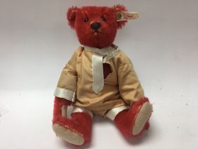 A boxed Baby Alfonzo Steiff bear.