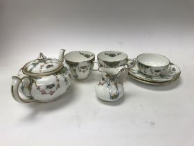 A two cup and saucer royal crown derby tea set, in