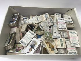 Seventy sets of good condition cigarette cards, in