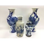 Four blue and white vases comprising a pair decora