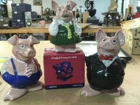 A collection of six Nat west pigs and two boxed bl