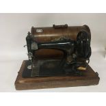 A Vintage cased singer sewing machine. NO RESERVE