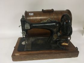 A Vintage cased singer sewing machine. NO RESERVE