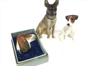 Ceramic dog figures including a Beswick Alsatian,