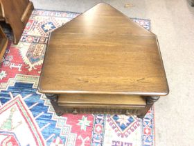 An Ercol TV stand with extendable back. 74W 46D 48
